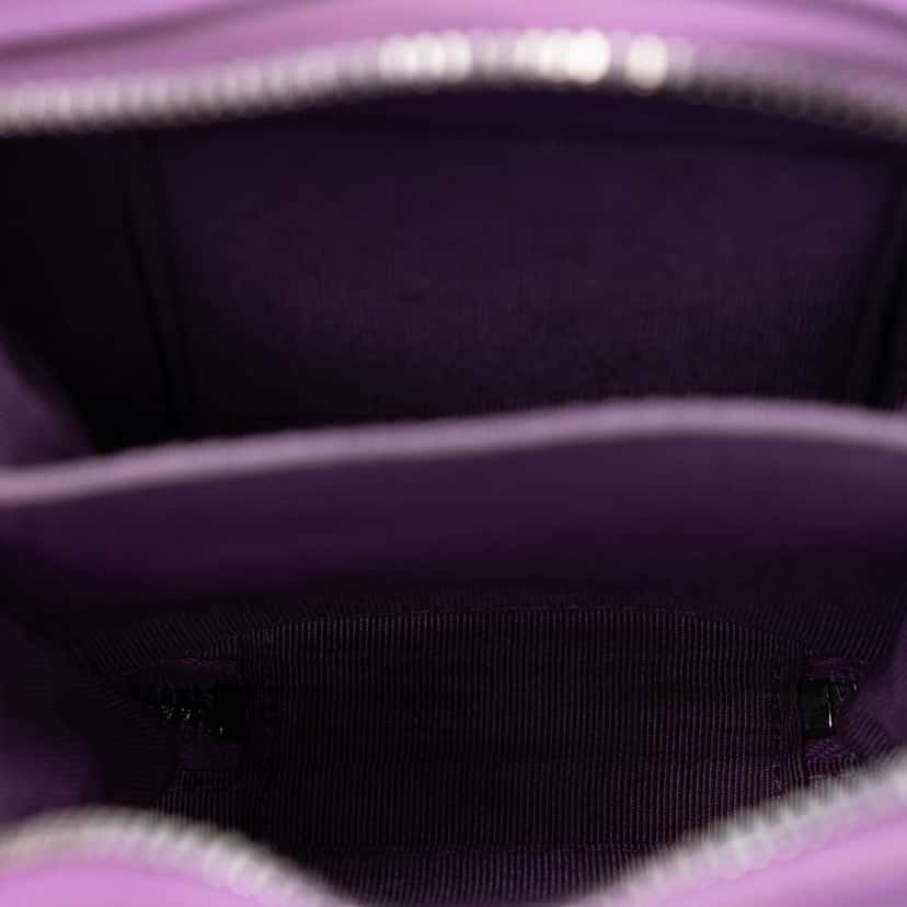 Chanel CC Quilted Lambskin Zip Phone Case Purple Leather Very good condition - Model View