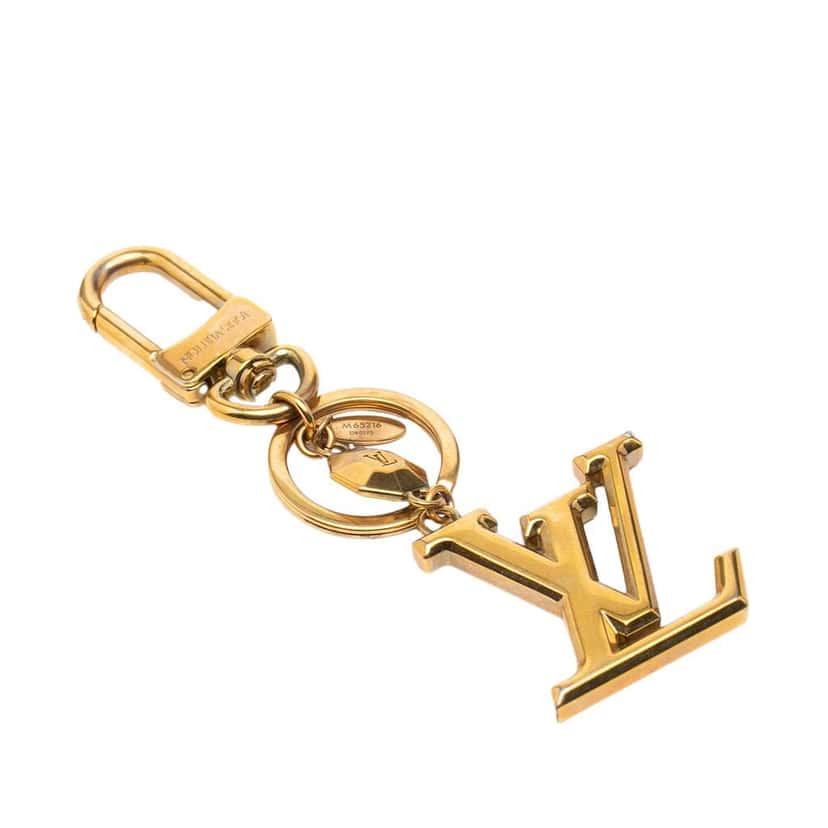 Louis Vuitton Gold Plated LV Facettes Bag Charm and Key Holder Gold Metal Very good condition - Front View
