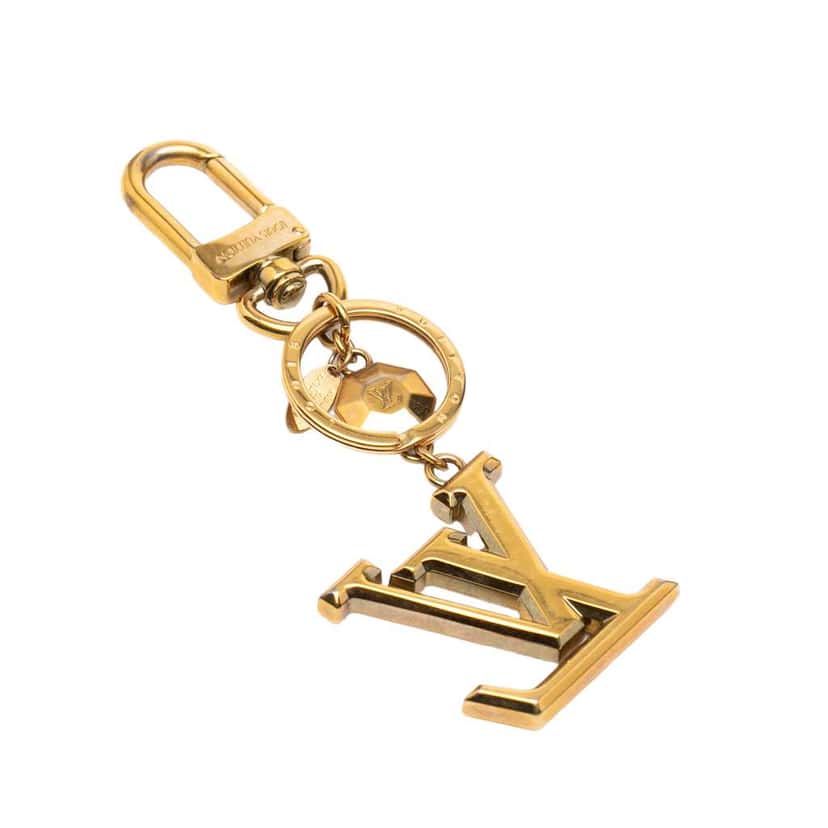 Louis Vuitton Gold Plated LV Facettes Bag Charm and Key Holder Gold Metal Very good condition - Back View