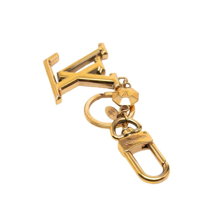 Louis Vuitton Gold Plated LV Facettes Bag Charm and Key Holder Gold Metal Very good condition - Box View