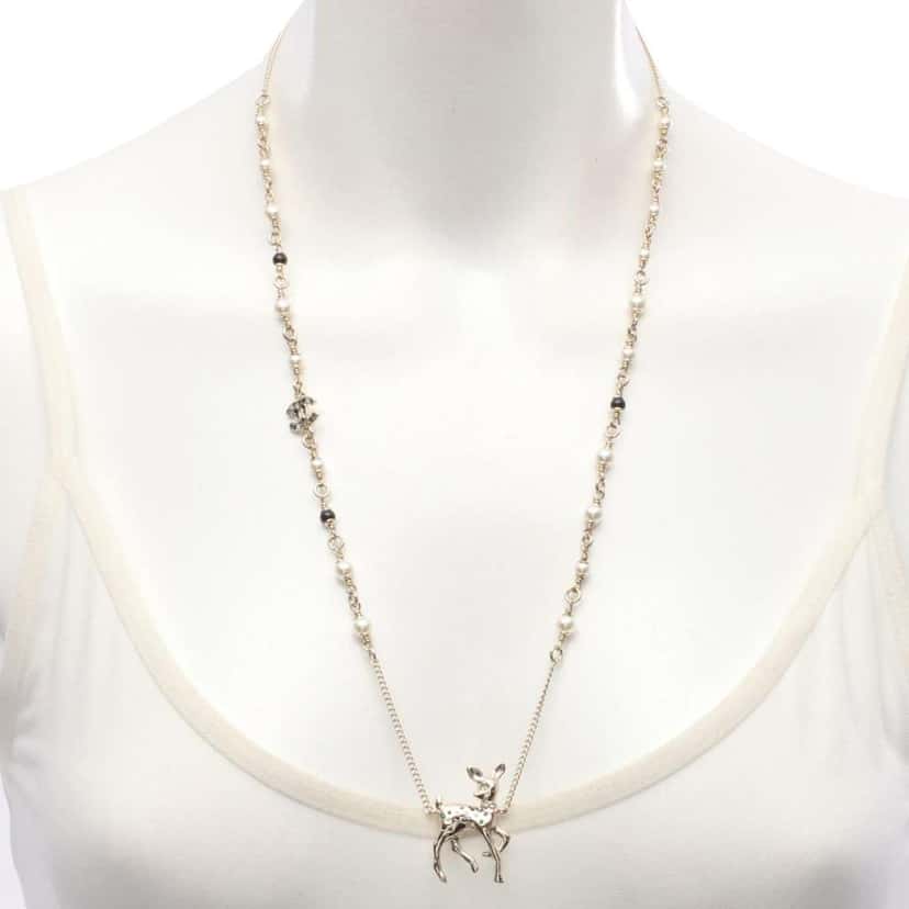 Chanel CC Gold Plated Faux Pearl and Rhinestone Deer Pendant Necklace Gold Metal Very good condition - Box View