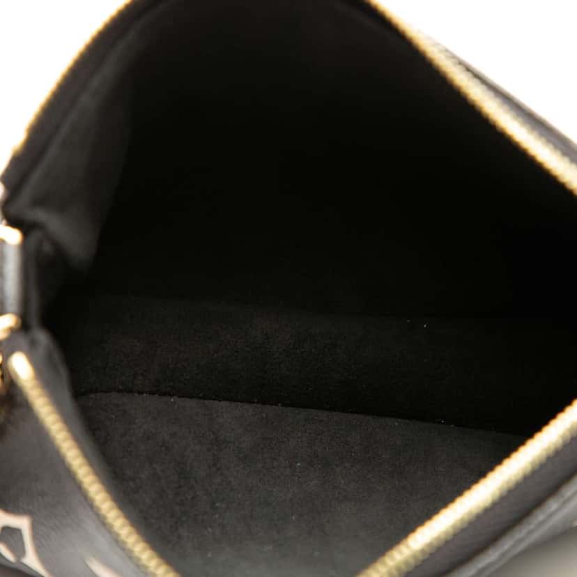 Louis Vuitton Bicolor Monogram Empreinte Mini Pochette Accessoires Black Leather Good condition - Model View
