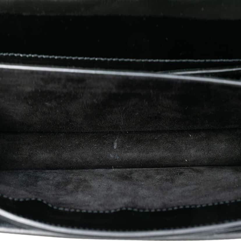 Saint Laurent Medium Textured Patent Monogram Sunset Crossbody Black Leather Good condition - Model View