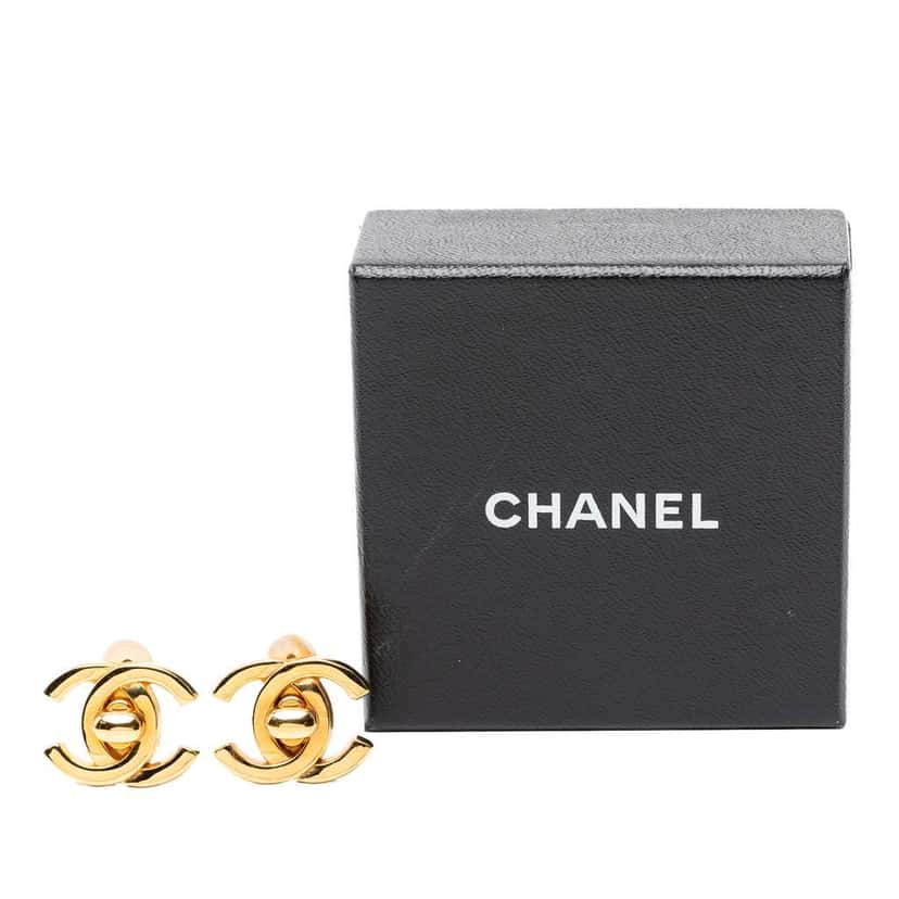Chanel Gold Plated CC Turn Lock Clip on Earrings Gold Metal Good condition - Model View