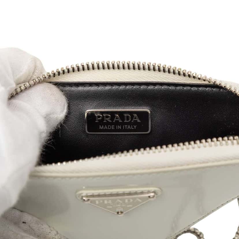 Prada Mini Brushed Leather Triangle Chain Pouch White Leather Very good condition - Box View