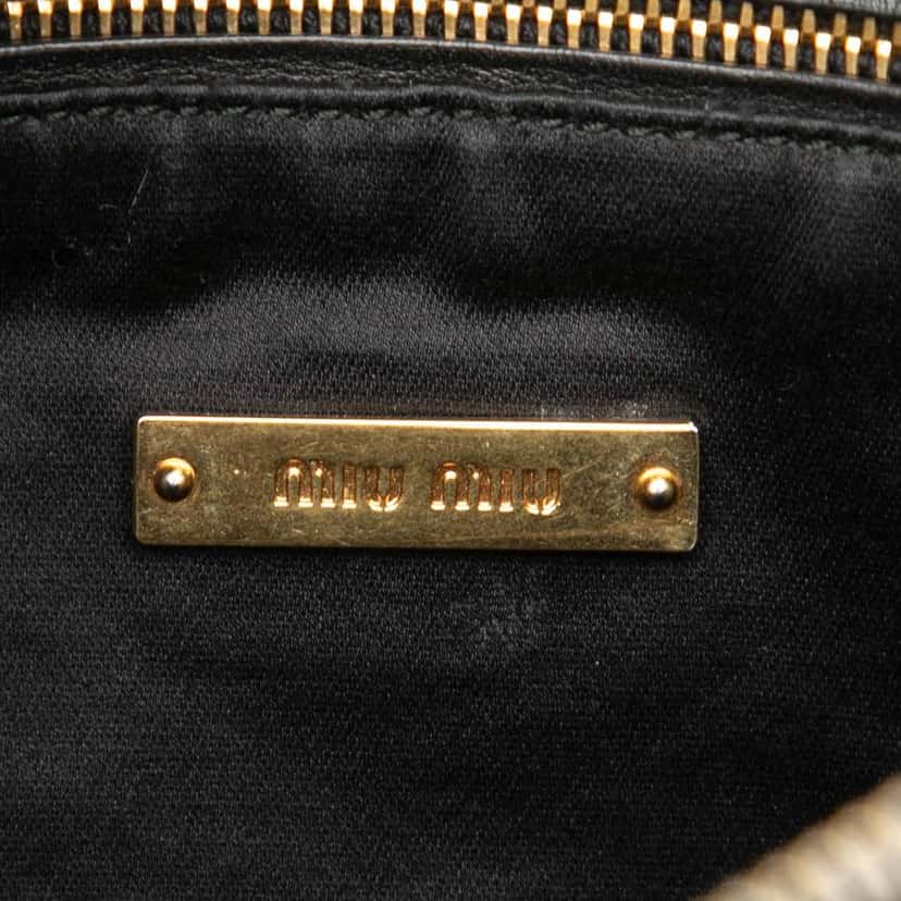 Miu Miu Studded Leather Zip Clutch Black Leather Very good condition - Box View