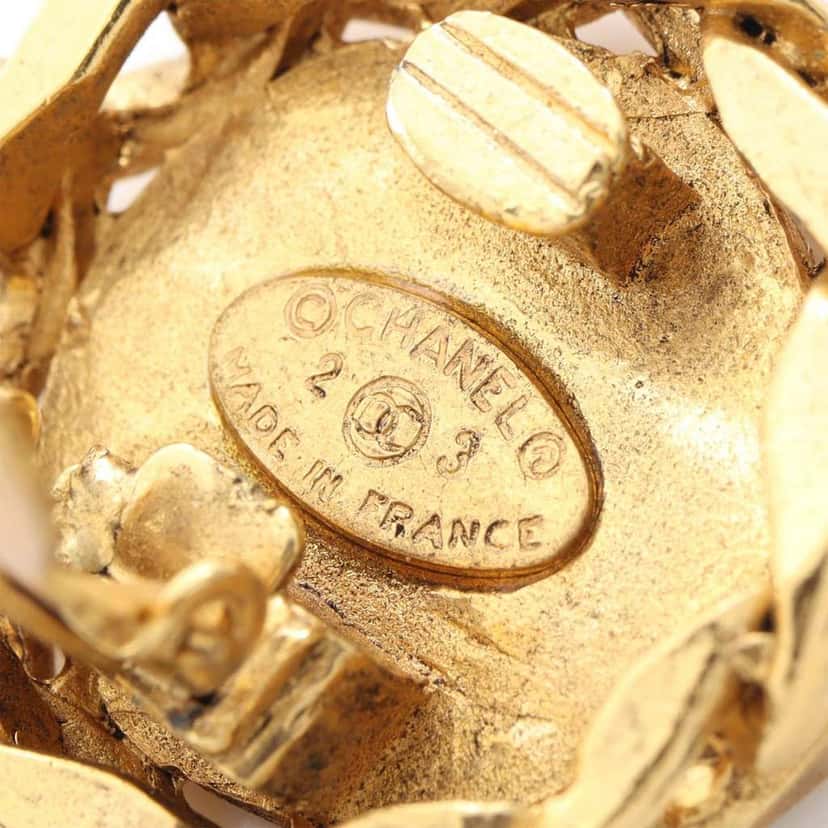 Chanel CC Gold Plated Rhinestone Round Clip On Earrings Gold Metal Good condition - Model View