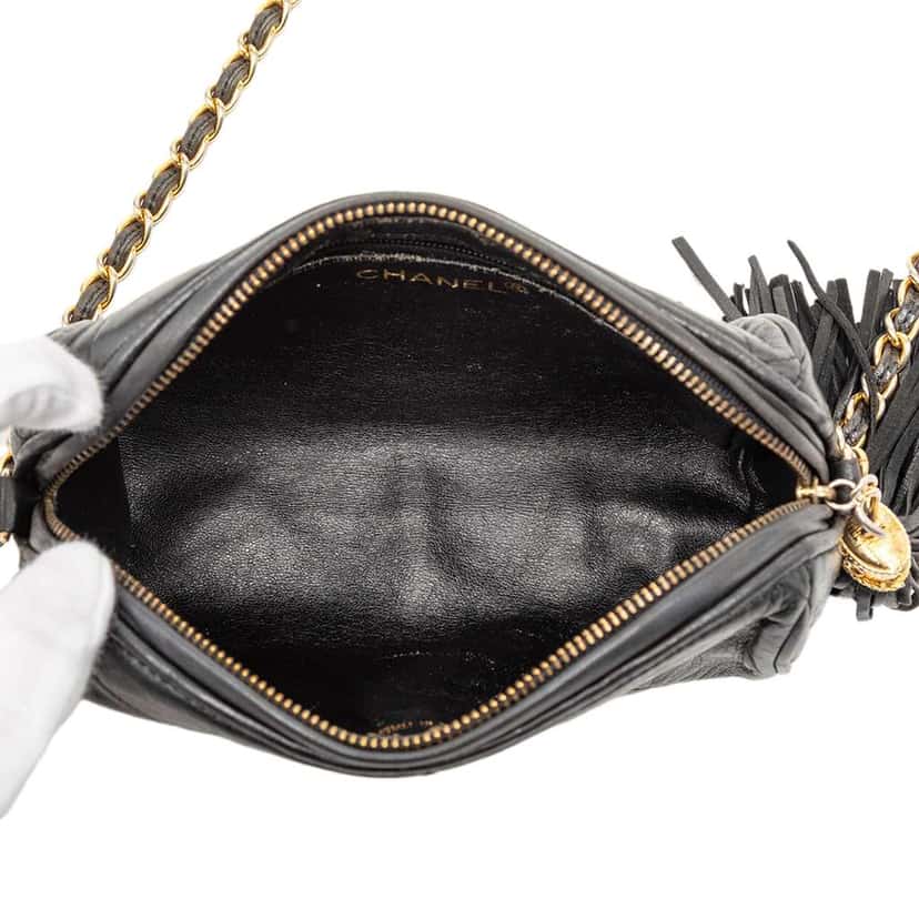 Chanel Quilted Lambskin Tassel Barrel Crossbody Black Leather Good condition - Model View