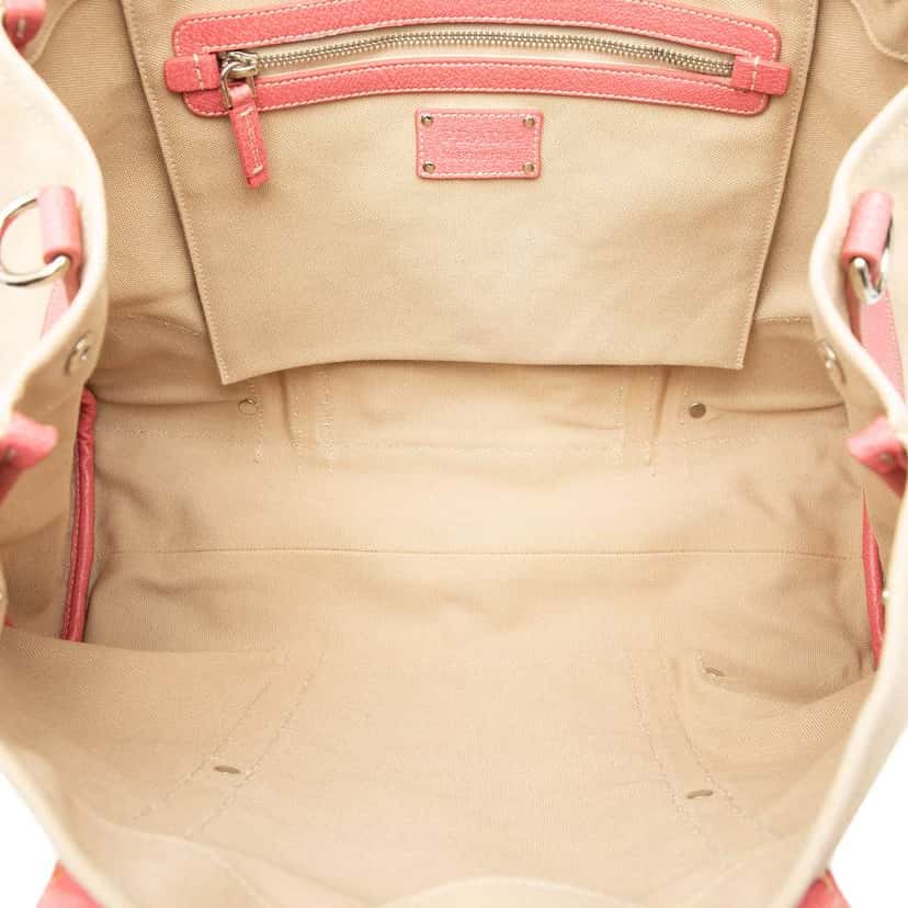 Prada Studded Leather Trimmed Canvas Front Pocket Tote Brown Canvas Very good condition - Model View