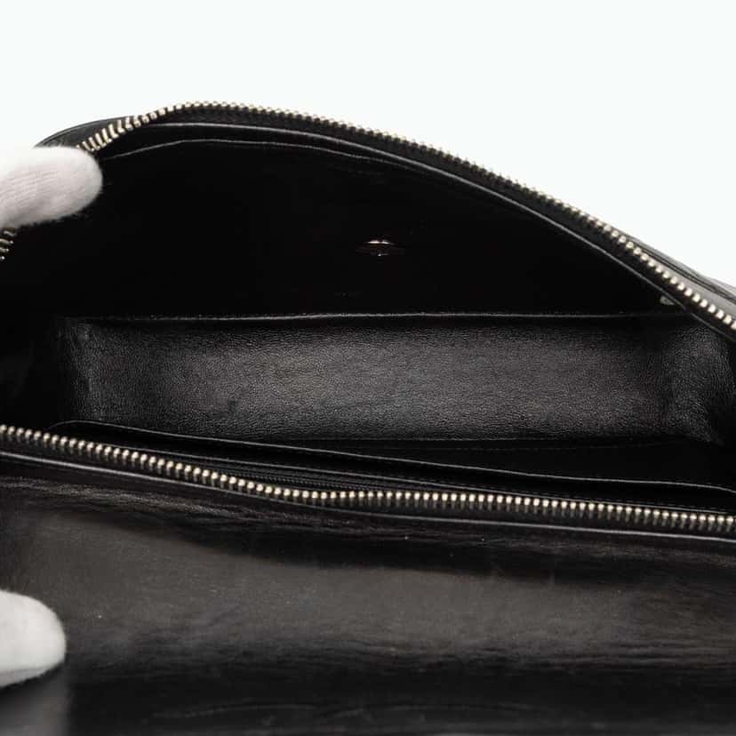 Chanel Medium Quilted Lambskin Flap Backpack Black Leather Very good condition - Model View