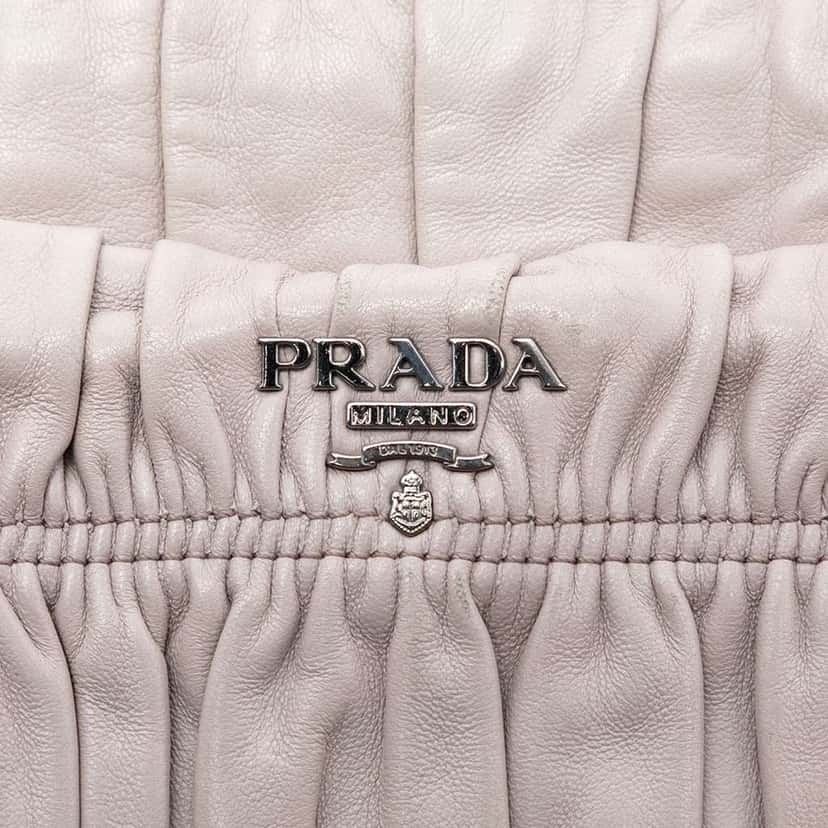 Prada Nappa Gaufre Turn Lock Clutch Brown Leather Very good condition - Box View