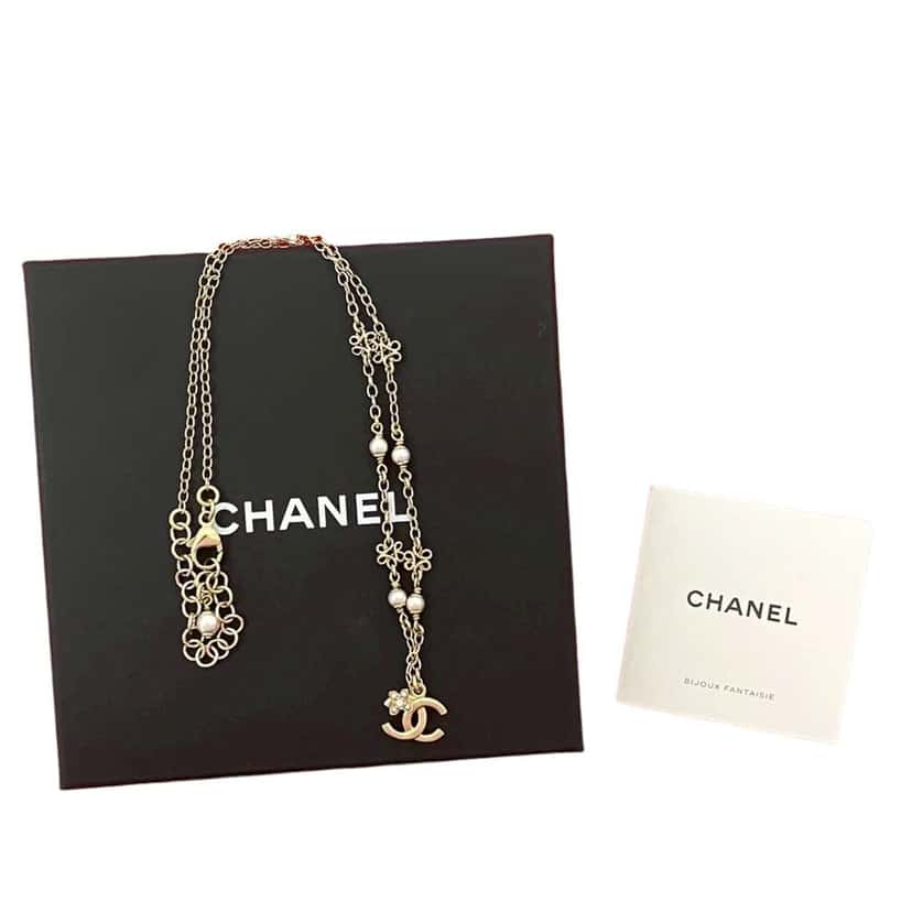 Chanel Gold Plated Faux Pearl CC Pendant Flower Station Necklace Gold Metal Very good condition - Box View