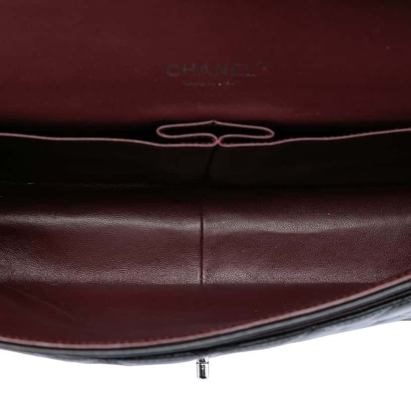 Chanel Maxi Classic Lambskin Double Flap Black Leather Very good condition - Model View