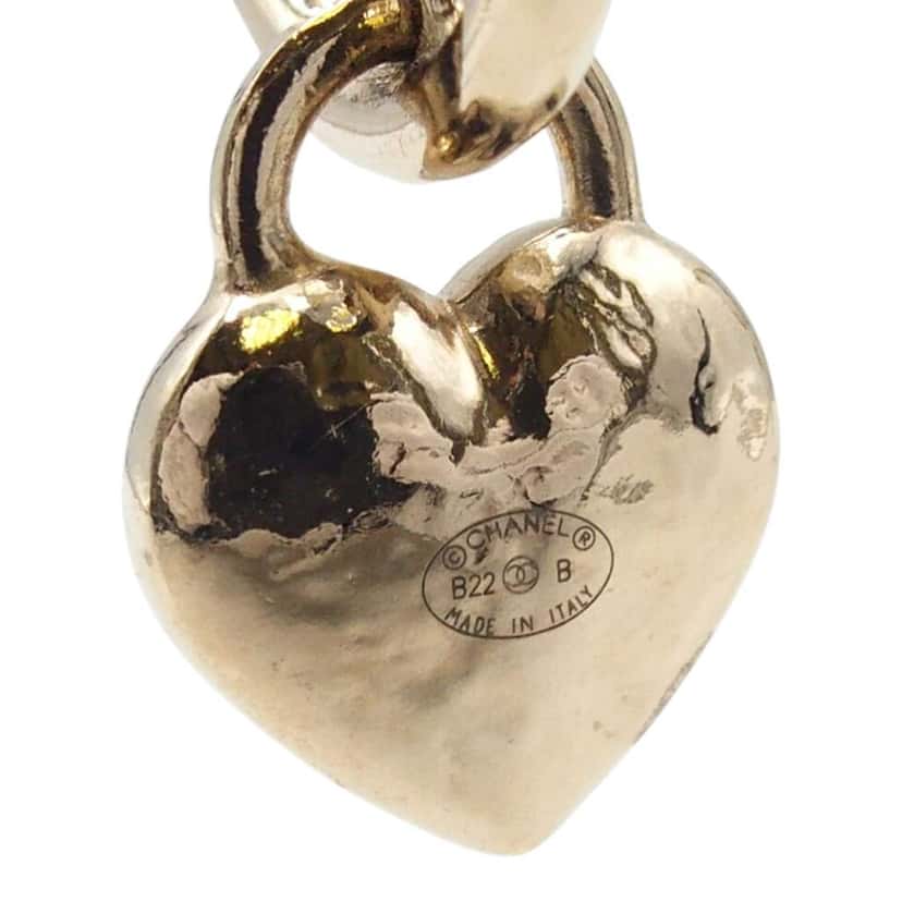 Chanel CC Gold Plated Turnlock Heart Hoop Push Back Earrings Gold Metal Very good condition - Model View
