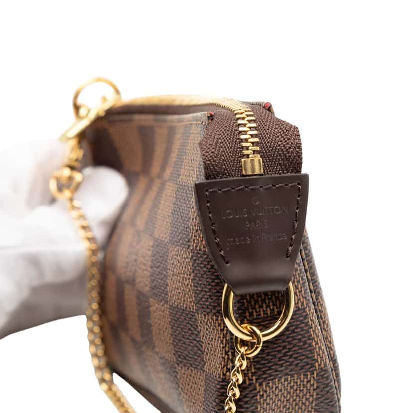 Louis Vuitton Damier Ebene Mini Pochette Accessoires Brown Very good condition - Box View