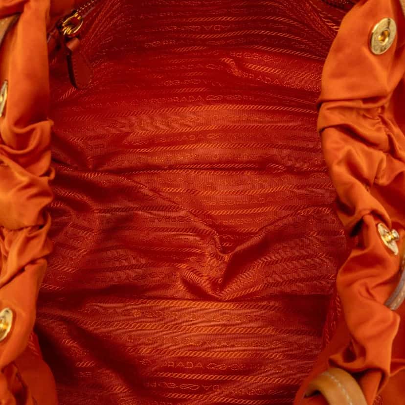 Prada Tessuto Logo Drawstring Tote Orange Very good condition - Model View
