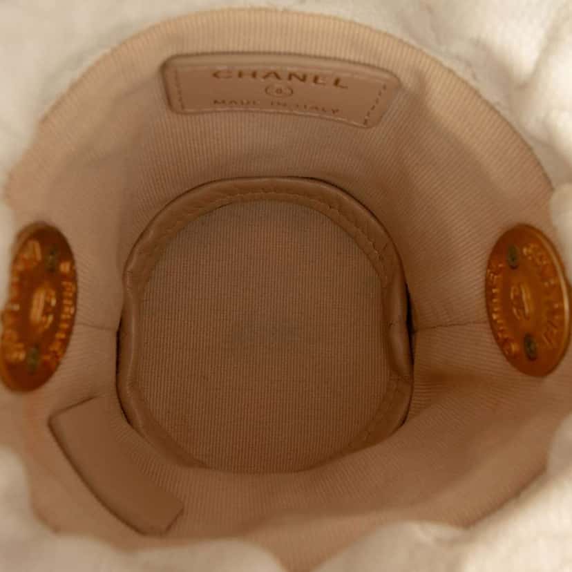 Chanel Mini Quilted Caviar Twist Your Buttons Drawstring Bucket Bag White Leather Very good condition - Model View