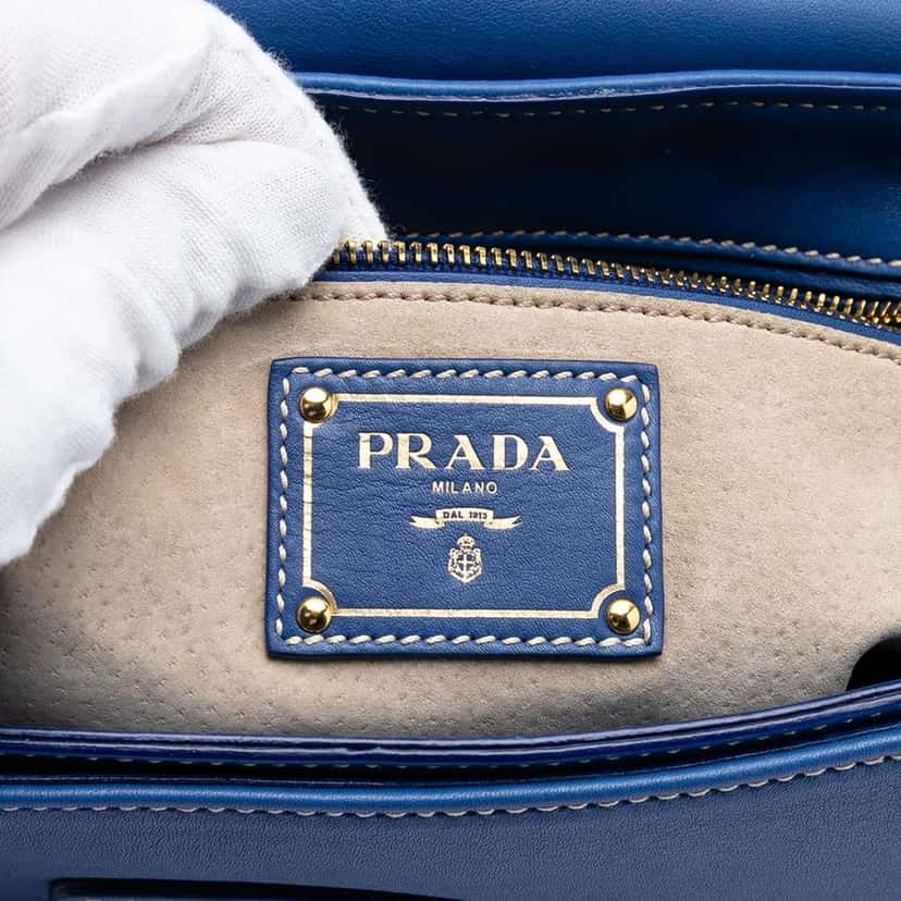 Prada City Calf Push Lock Flap Crossbody Blue Leather Very good condition - Box View