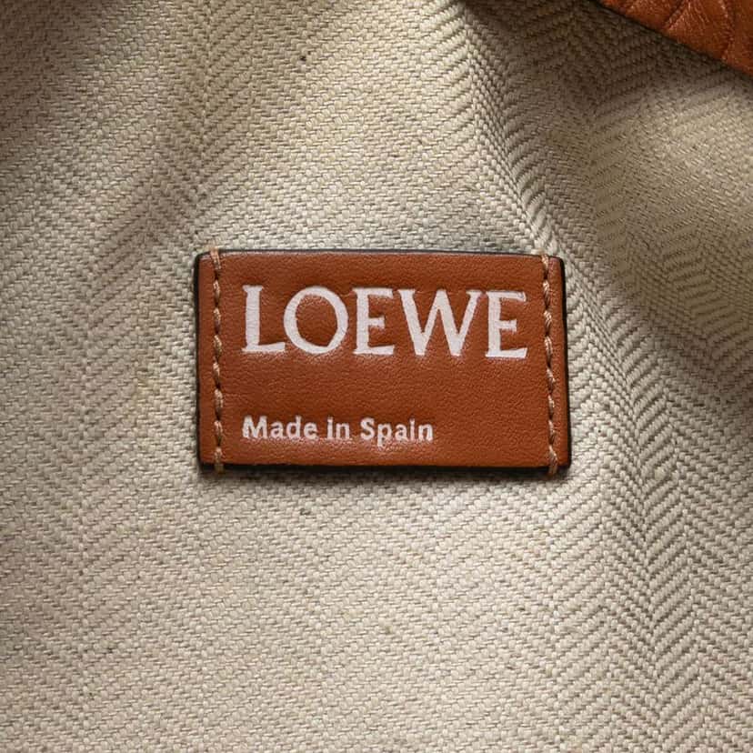 Loewe Embossed Anagram Leather Repeat T Clutch Brown Leather Very good condition - Box View
