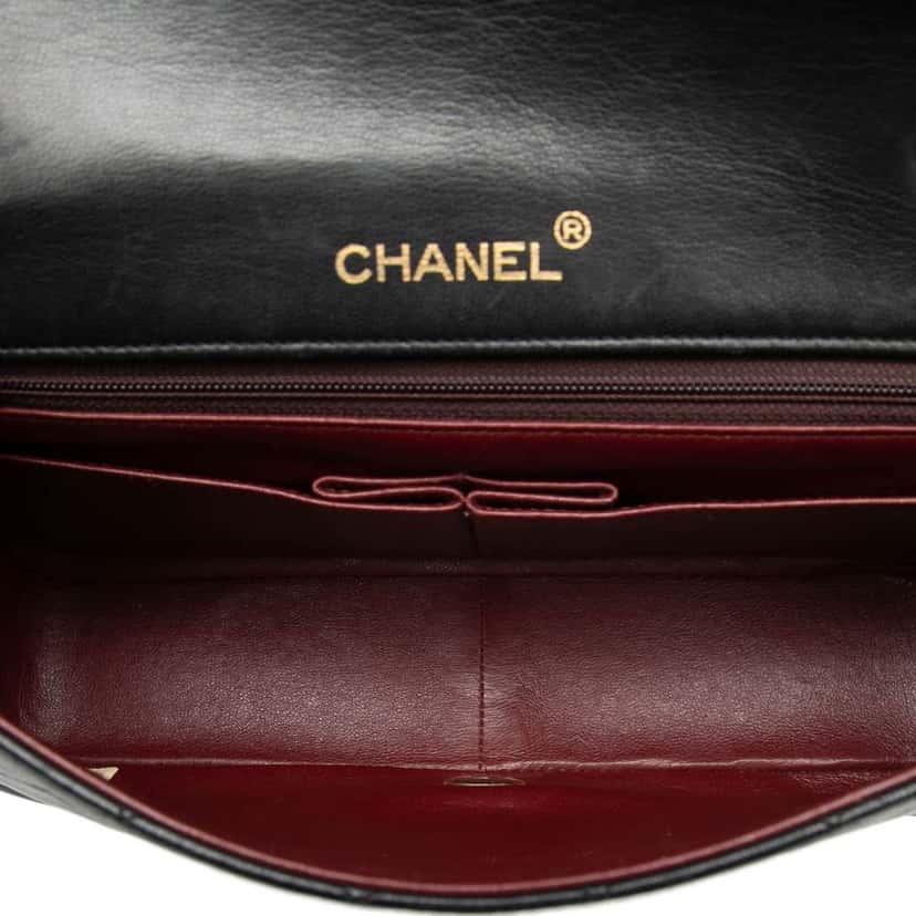 Chanel Medium Quilted Lambskin Full Flap Black Leather Very good condition - Model View