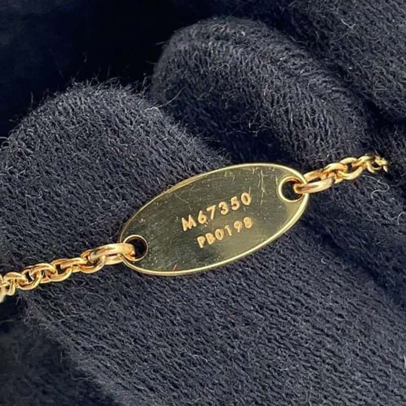 Louis Vuitton Gold Plated In The Sky Zodiac Bracelet Gold Metal Very good condition - Model View