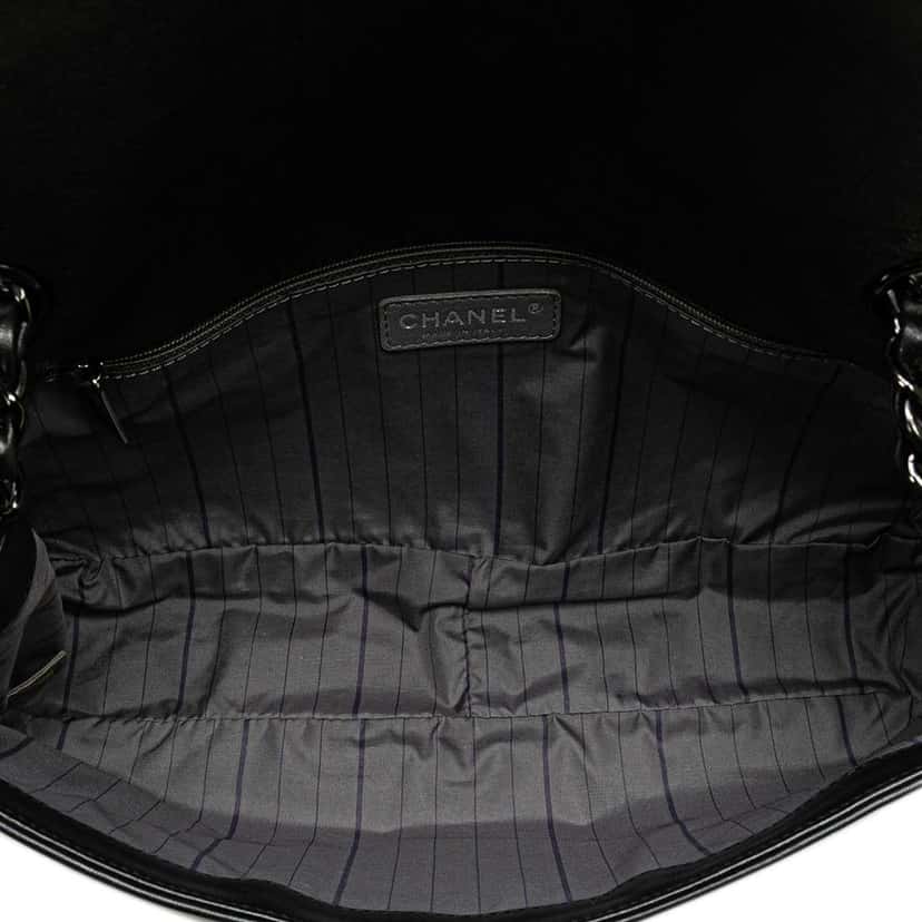 Chanel CC Studded Lambskin East West Flap Black Leather Very good condition - Model View