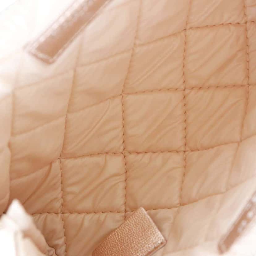 Chanel Metallic Quilted Lambskin Cosmetic Pouch Pink Leather Very good condition - Model View