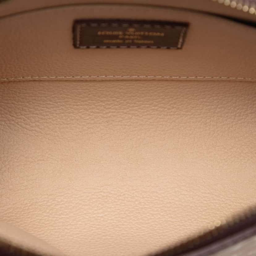 Louis Vuitton Monogram Mini Lin Cosmetic Pouch Red Canvas Very good condition - Model View