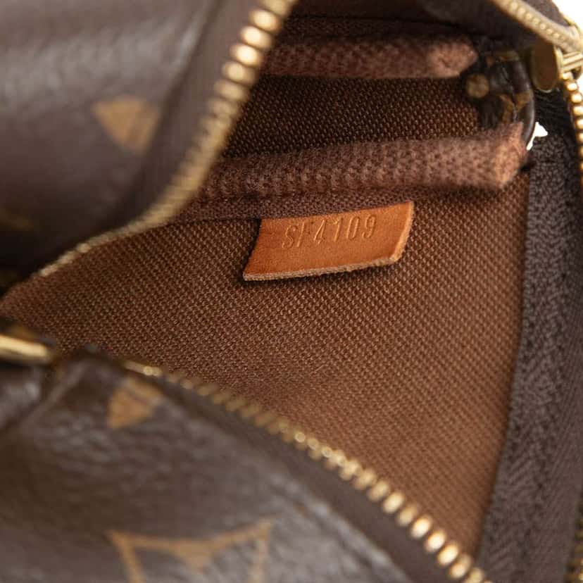 Louis Vuitton Monogram Mini Pochette Accessoires Brown Very good condition - Box View