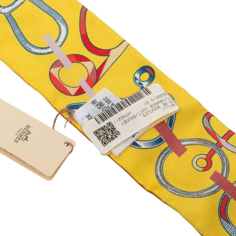 Hermès Do Re Boucles Silk Twilly Scarf Orange Silk Never worn - Model View