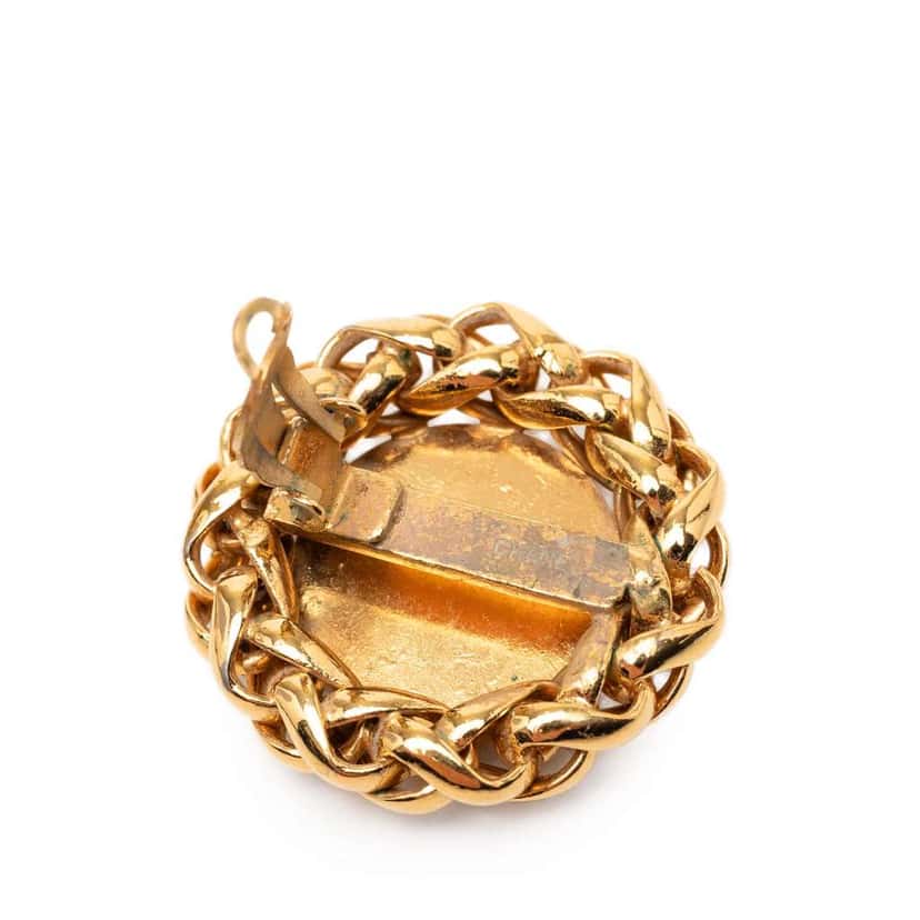 Chanel CC Gold Plated Wheat Medallion Clip On Earrings Gold Metal Very good condition - Model View