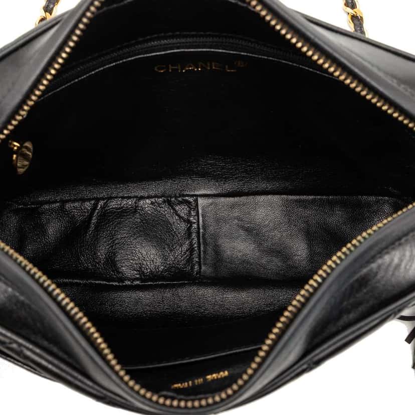 Chanel CC Quilted Lambskin Tassel Camera Bag Black Leather Good condition - Model View