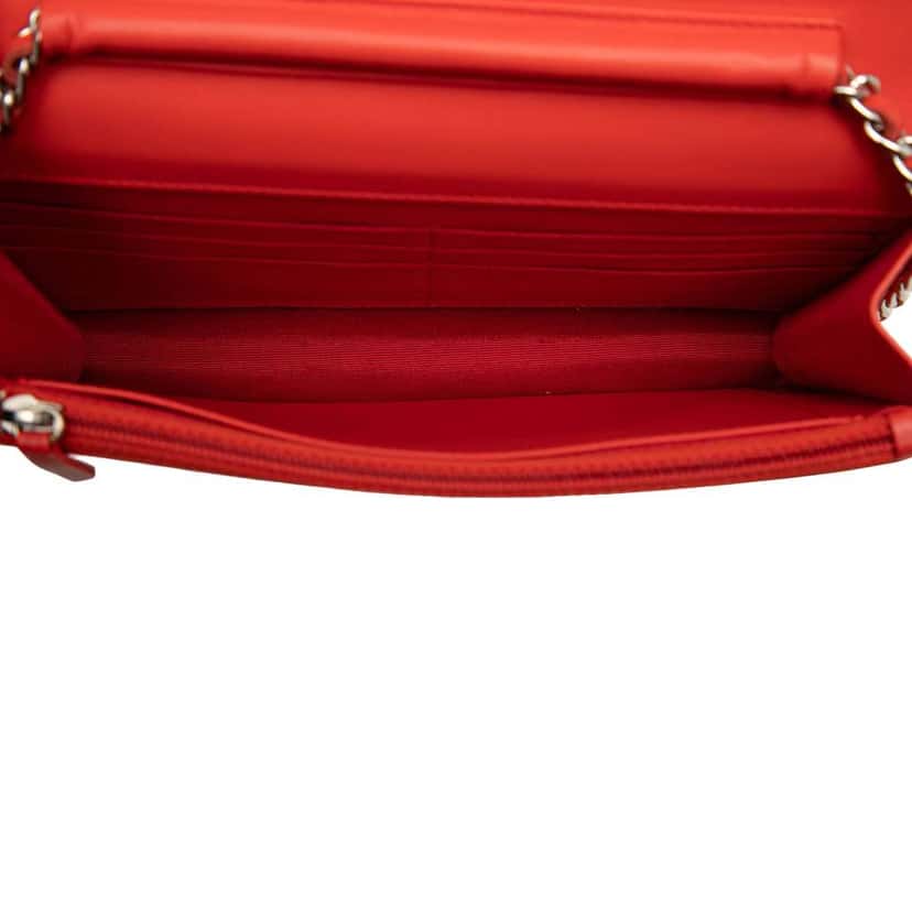 Chanel CC Patent Wallet on Chain Orange Leather Fair condition - Model View