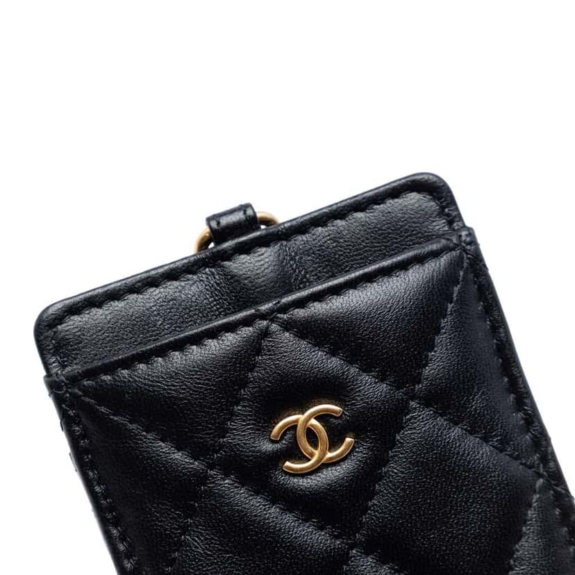 Chanel Quilted Lambskin Pearl Crown CC Wristlet Multi Pouches Black Leather Good condition - Model View