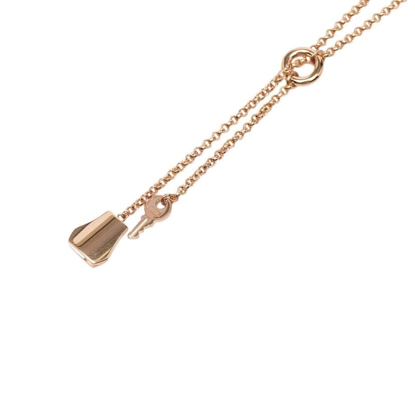 Hermès Small 18k Rose Gold Kelly Clochette Pendant Necklace Pink Rose Gold Good condition - Box View