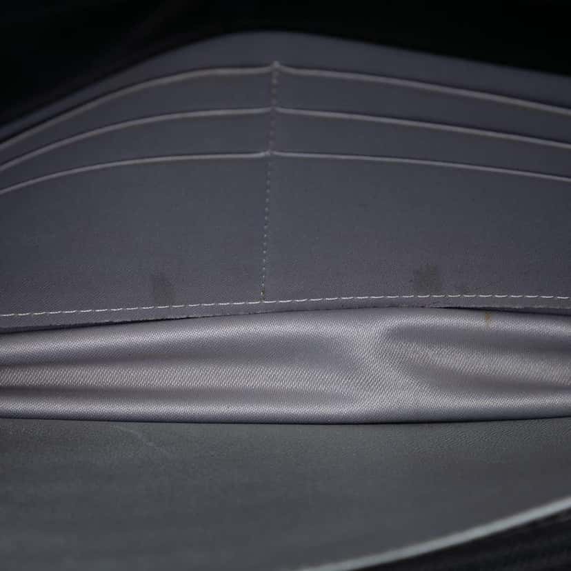 Chanel CC Embossed Lambskin Camellia Wallet On Chain Black Leather Very good condition - Model View