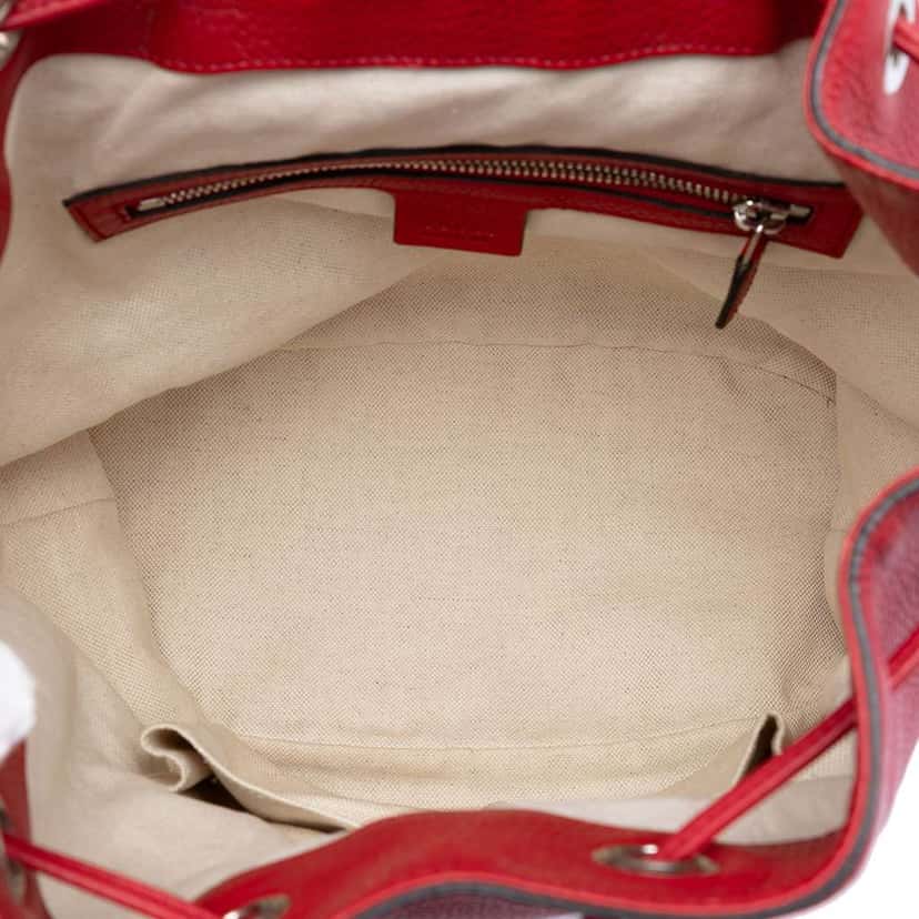 Gucci Small Pebbled Calfskin Soho Drawstring Backpack Red Leather Very good condition - Model View