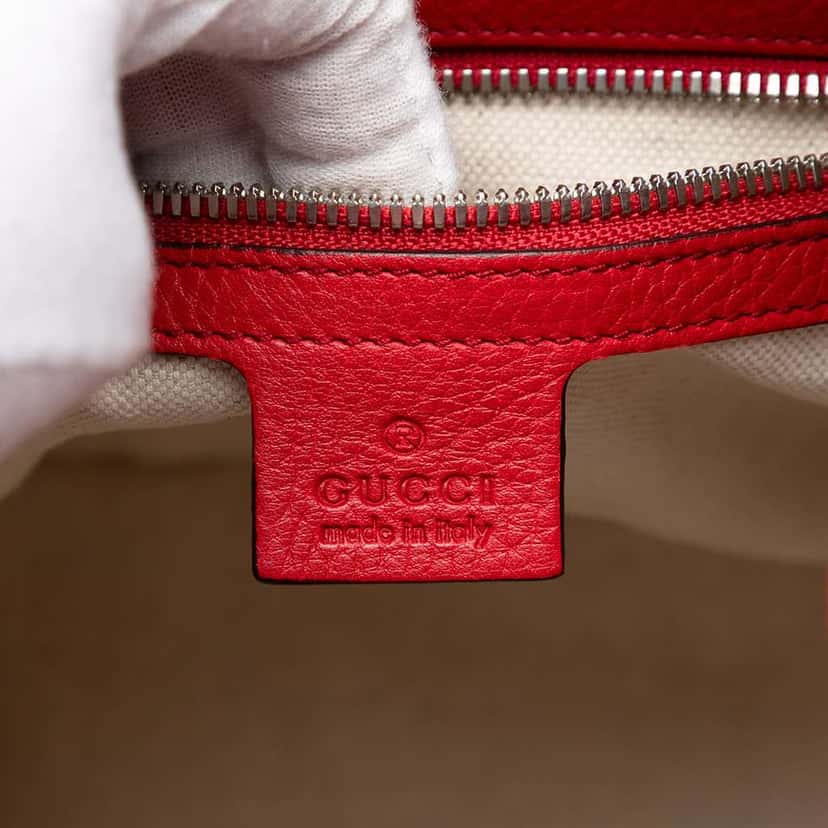 Gucci Small Pebbled Calfskin Soho Drawstring Backpack Red Leather Very good condition - Box View