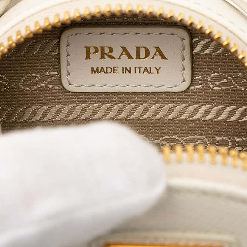 Prada Mini Saffiano Triangle Pouch White Leather Very good condition - Box View