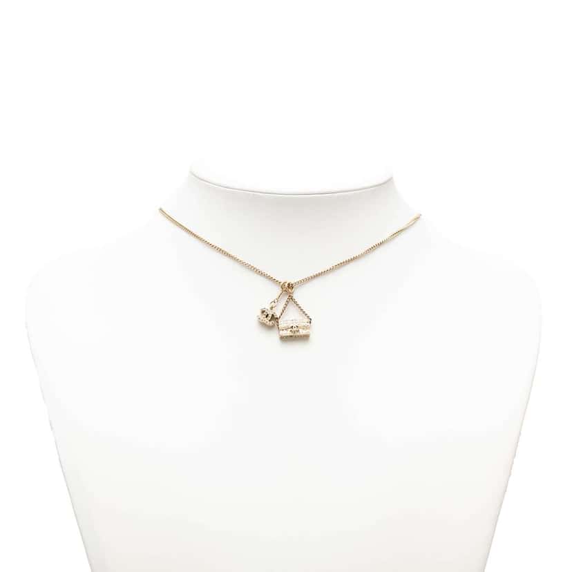 Chanel Gold Plated Rhinestone CC and Flap Bag Pendant Necklace Gold Metal Very good condition - Box View