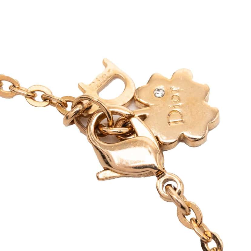 Dior Gold Plated Crystal Heart Charms Bracelet Gold Metal Very good condition - Model View