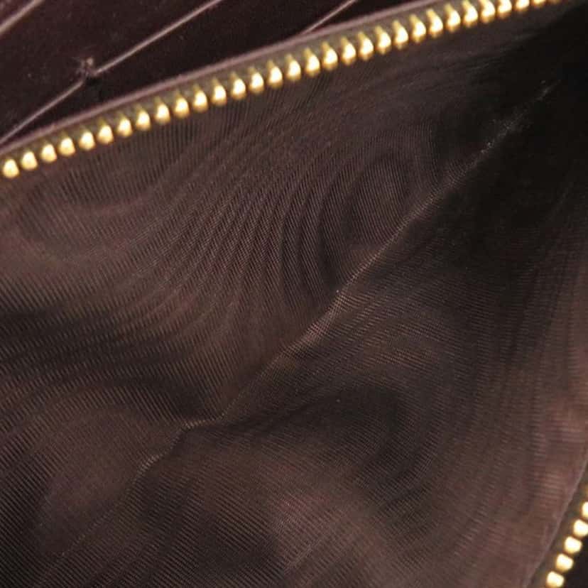 Prada Pony Hair Leopard Print Zip Around Wallet Beige Very good condition - Model View