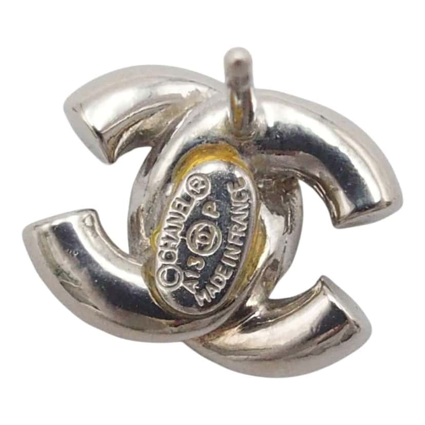 Chanel CC Plated Brass Strass Push Back Earrings Silver Brass Very good condition - Model View