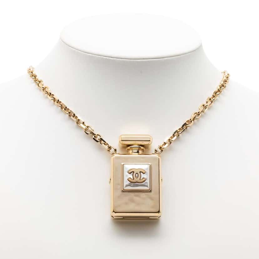 Chanel CC Gold Plated Perfume Bottle Locket Pendant Necklace Gold Metal Very good condition - Model View