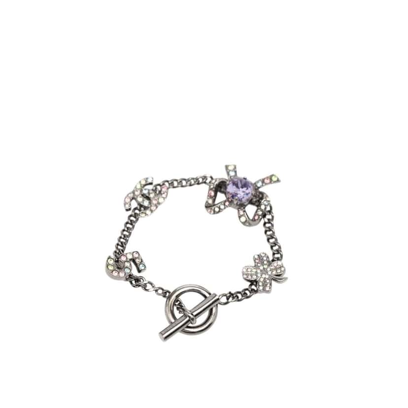 Chanel Silver Plated Crystal CC No. 5 Bow Charm Bracelet Silver Metal Very good condition - Inside View