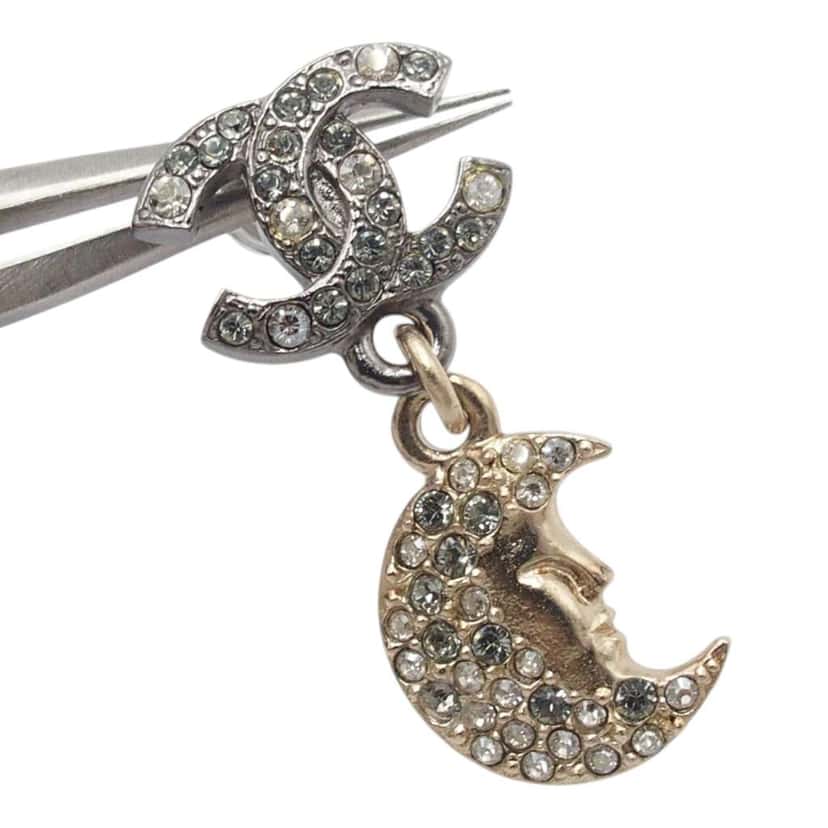 Chanel CC Silver and Gold Plated Crystal Moon and Star Drop Earrings Silver Metal Very good condition - Model View