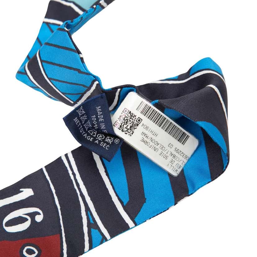 Hermès Jeu de Soie Uniforme Twilly Silk Scarf Blue Silk Never worn - Box View