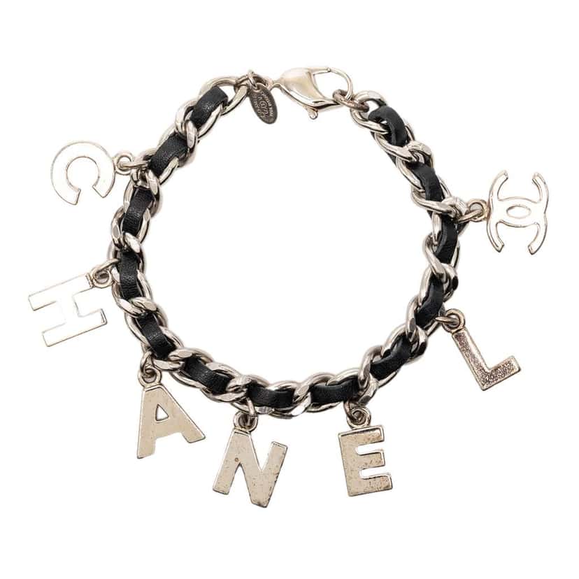 Chanel Silver Plated and Leather Woven Logo Charm Bracelet Silver Metal Very good condition - Front View
