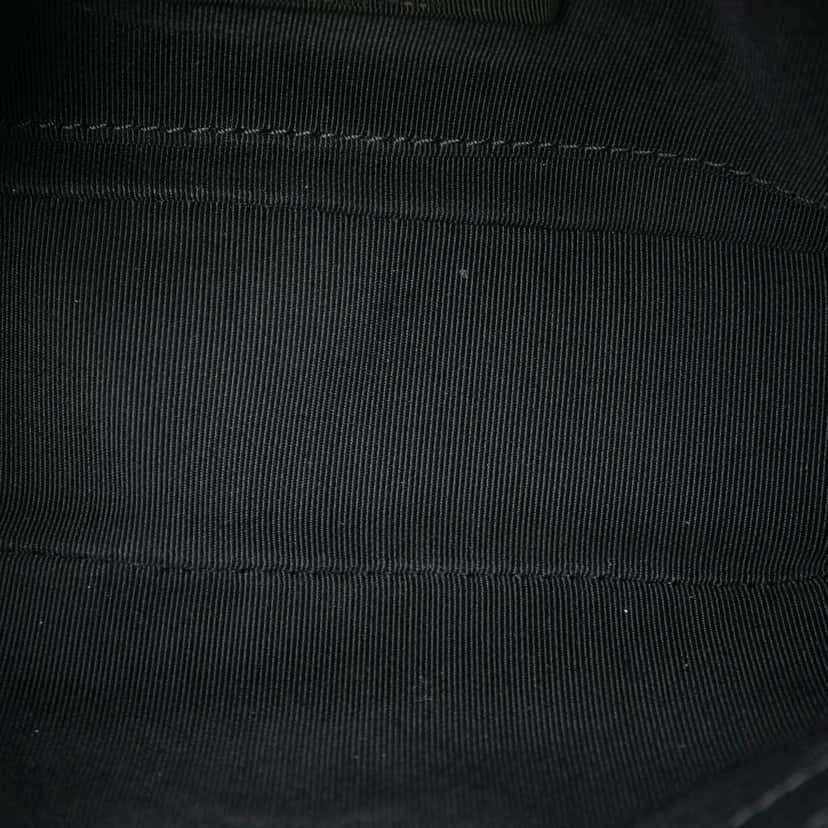 Chanel Quilted Lambskin Turn and Lock Flap Black Leather Good condition - Model View