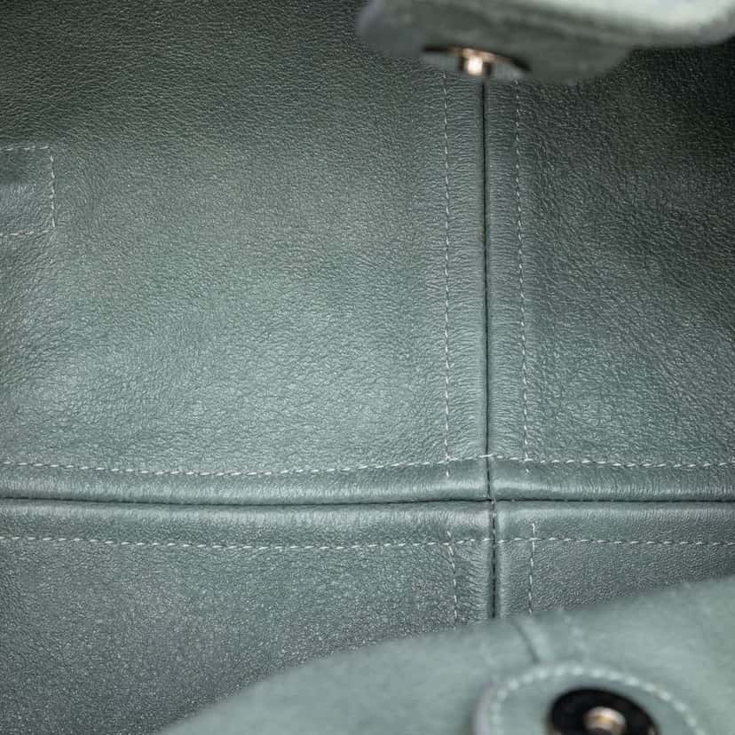 Chanel Grained Nubuck Camellia Patch Shopping Tote Green Leather Very good condition - Model View